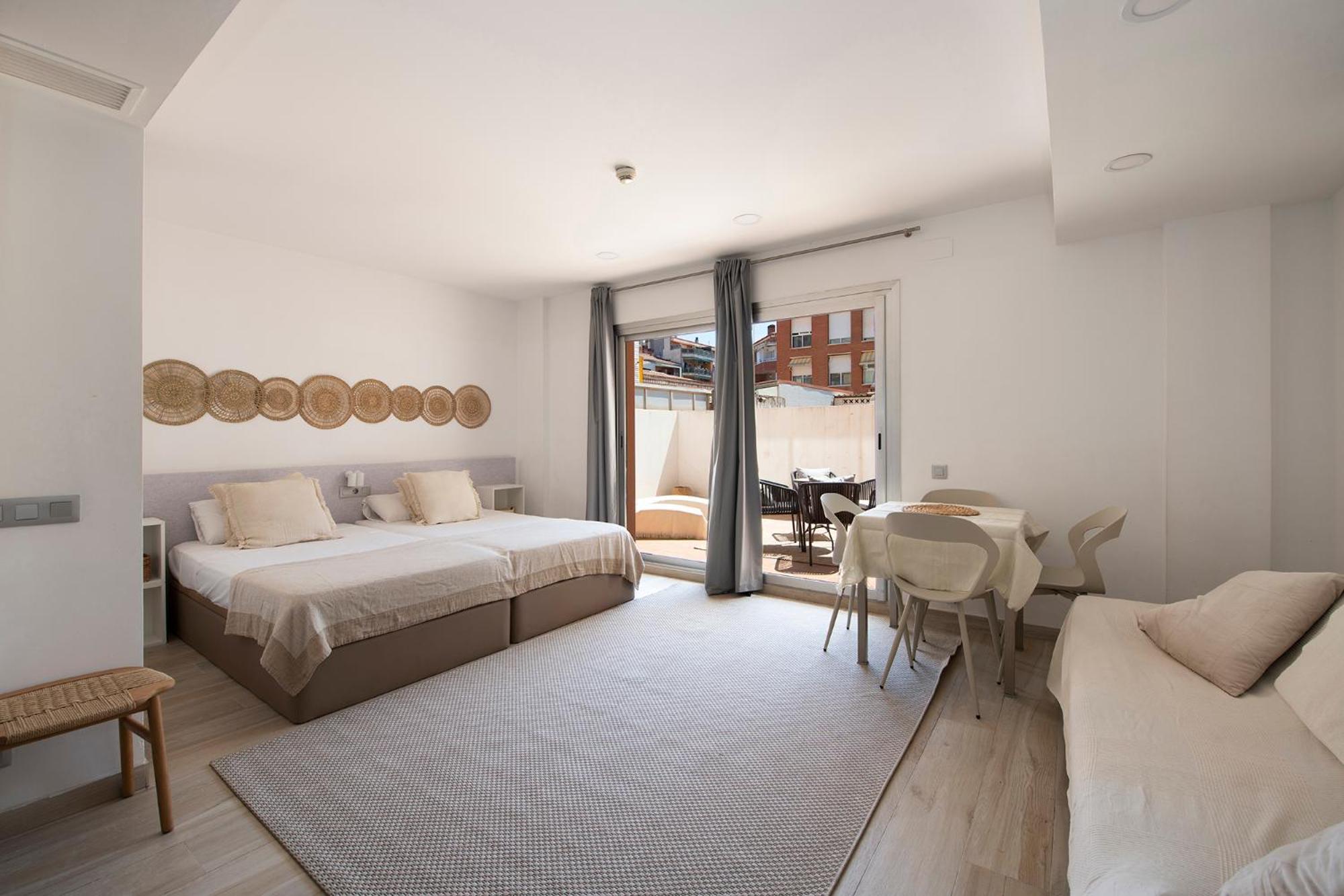 Aparthotel Centric Castelldefels Habitación foto